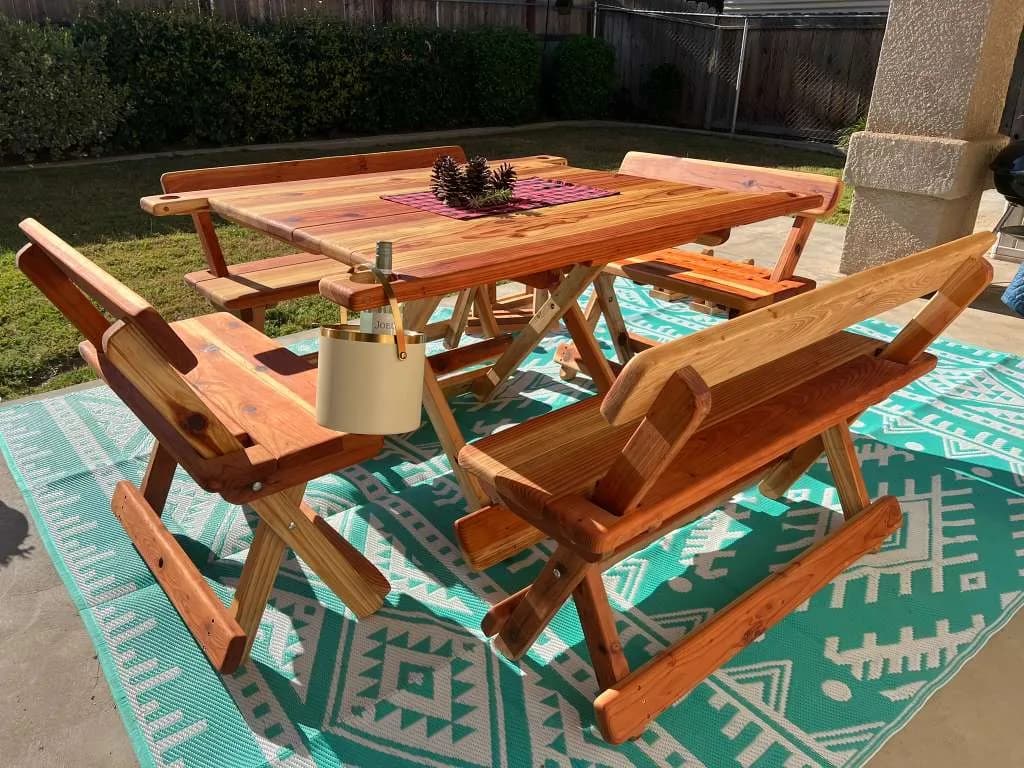 Michael Frazier redwood table and benches opened for outdoor dining
